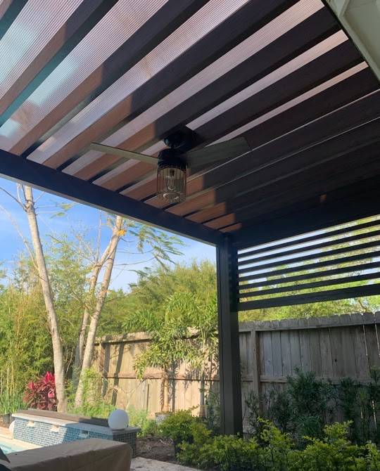 Modern Covered Pergola in Houston, TX with a privacy wall